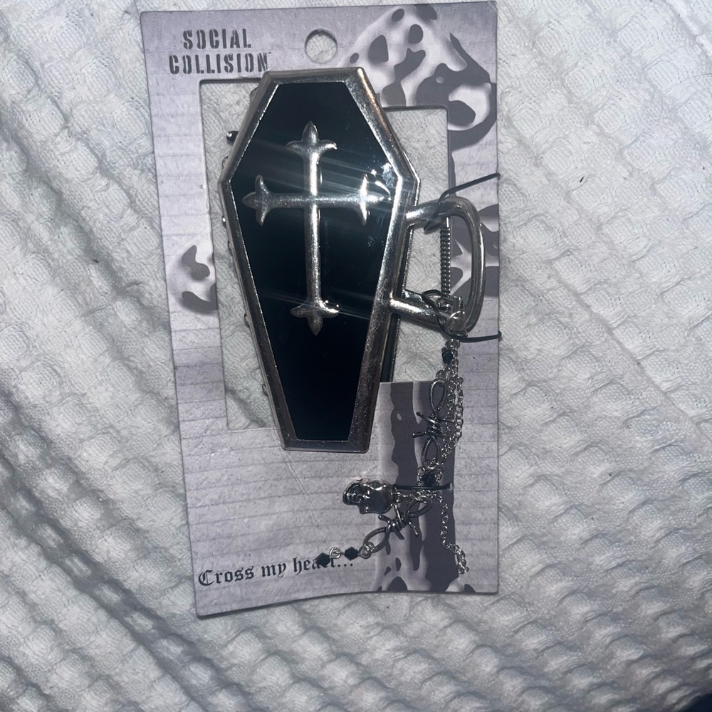 Social collision coffin hair clip